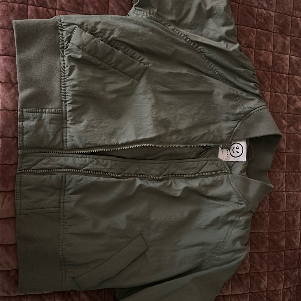 Gilly Hicks army green bomber jacket with rouched sleeve. Never been worn.